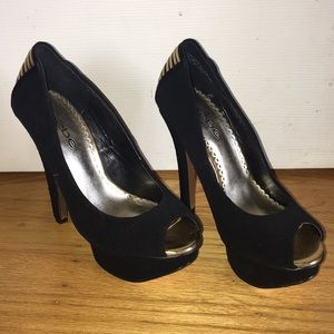 Bebe black and gold heels